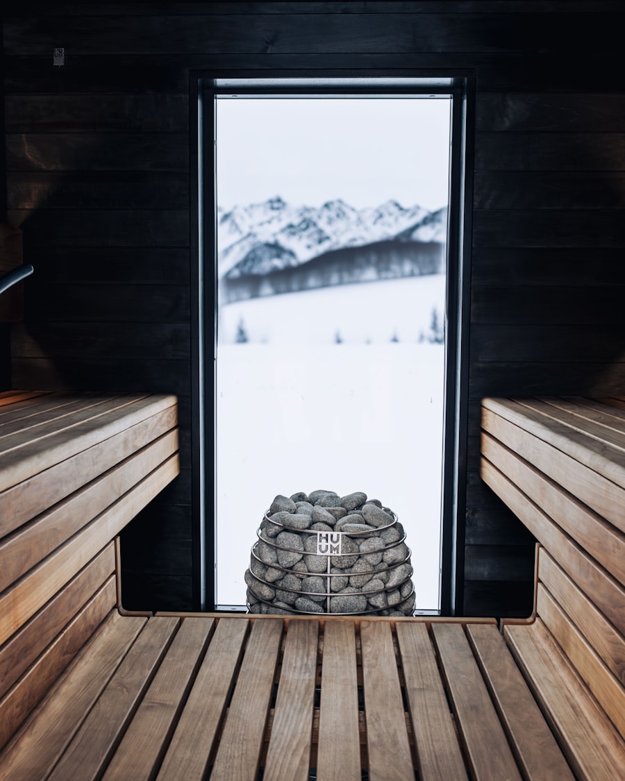 Sauna interior with a window and heated stones